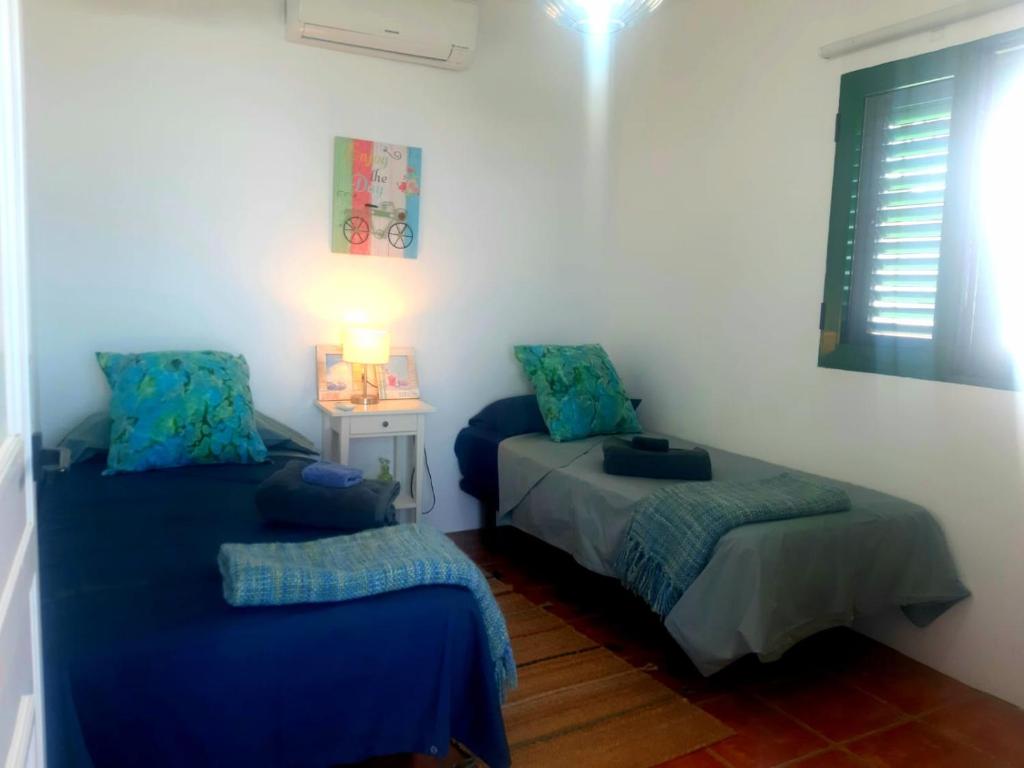 Een bed of bedden in een kamer bij Esencia Lanzarote