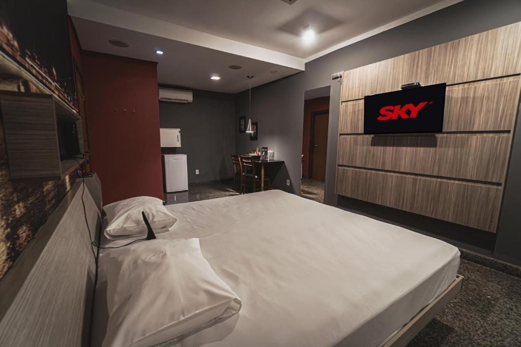 Postel nebo postele na pokoji v ubytování Paris Motel