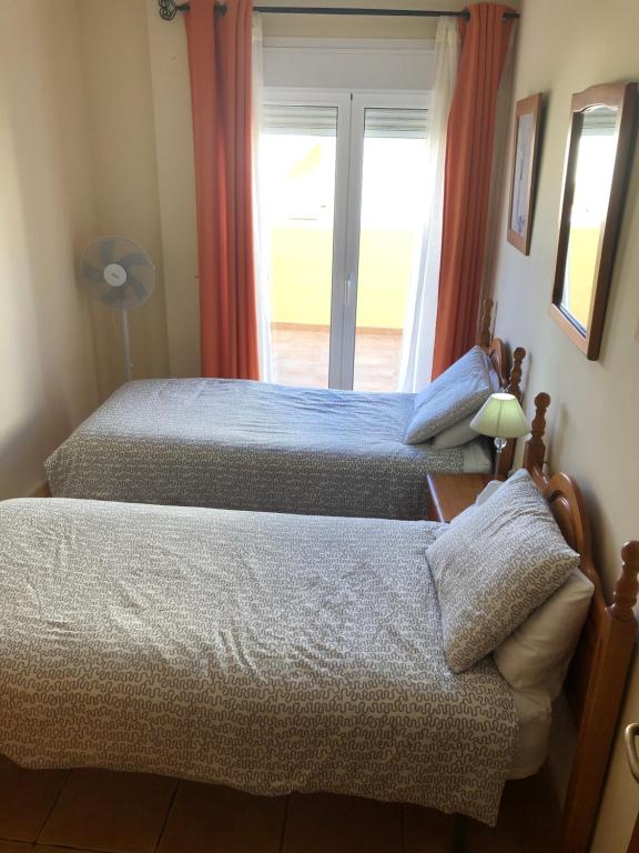 A bed or beds in a room at 39 El Sultan, Calle el Roque
