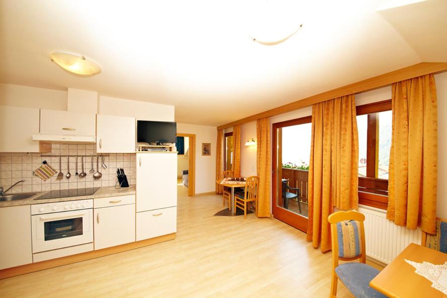 Kuchyň nebo kuchyňský kout v ubytování Residence Tauber