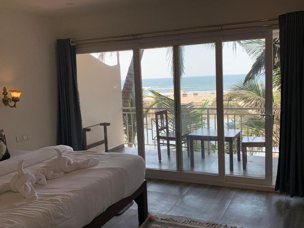 Postel nebo postele na pokoji v ubytování Chique Shanti Resort