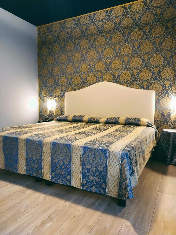 Postel nebo postele na pokoji v ubytování LAERTE PALACE HOTEL