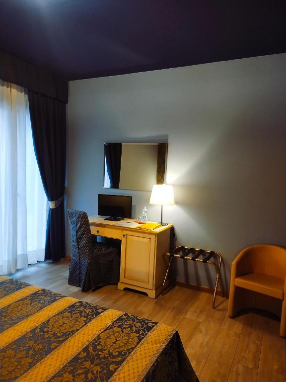 Postel nebo postele na pokoji v ubytování LAERTE PALACE HOTEL
