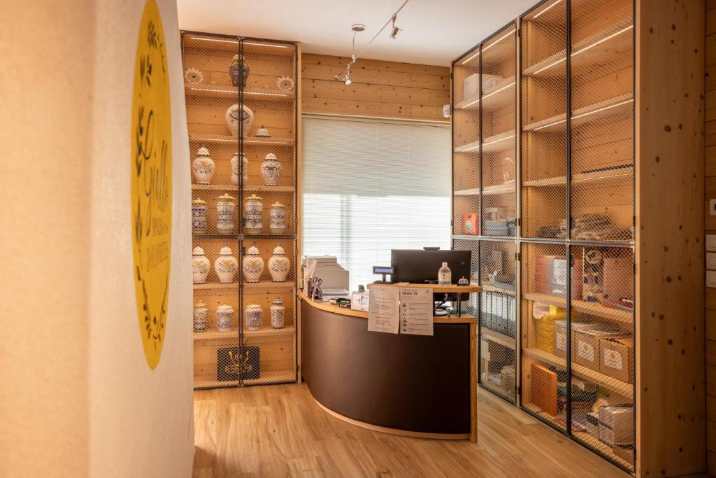 Kuchyň nebo kuchyňský kout v ubytování Giallo Dolomiti Wellness