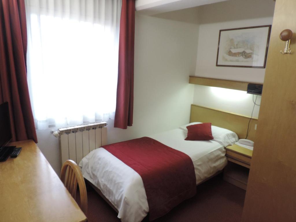 Postel nebo postele na pokoji v ubytování Grand Hotel Miramonti