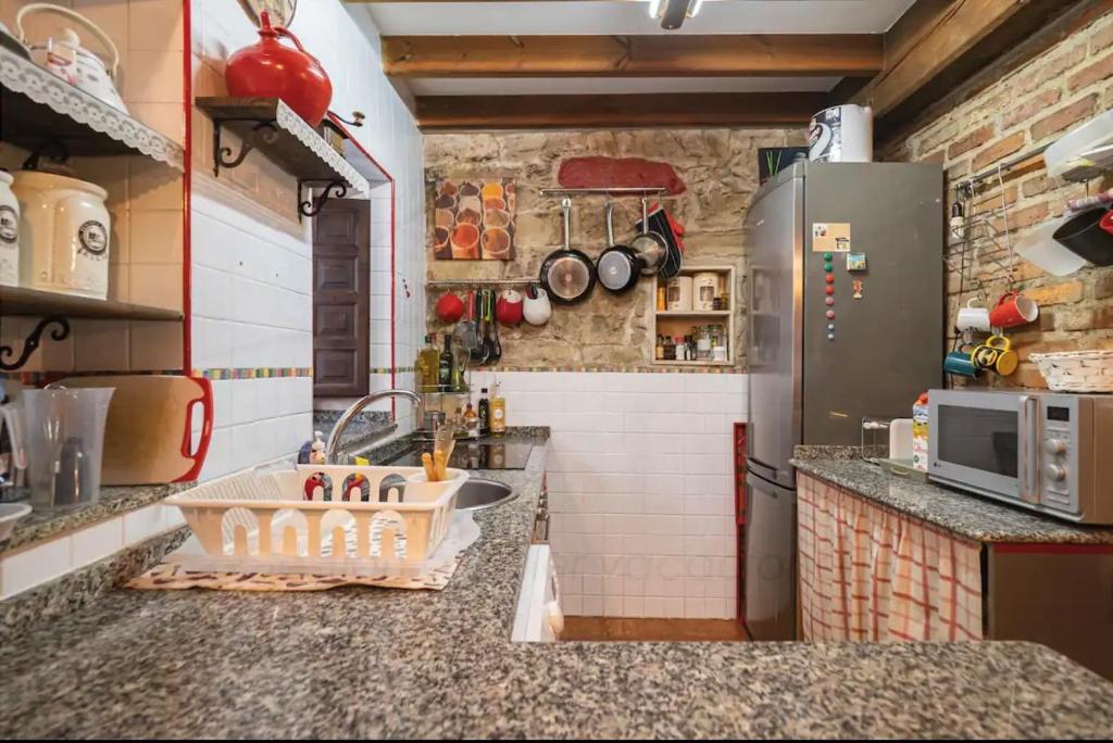 Kuchyň nebo kuchyňský kout v ubytování La casita azul