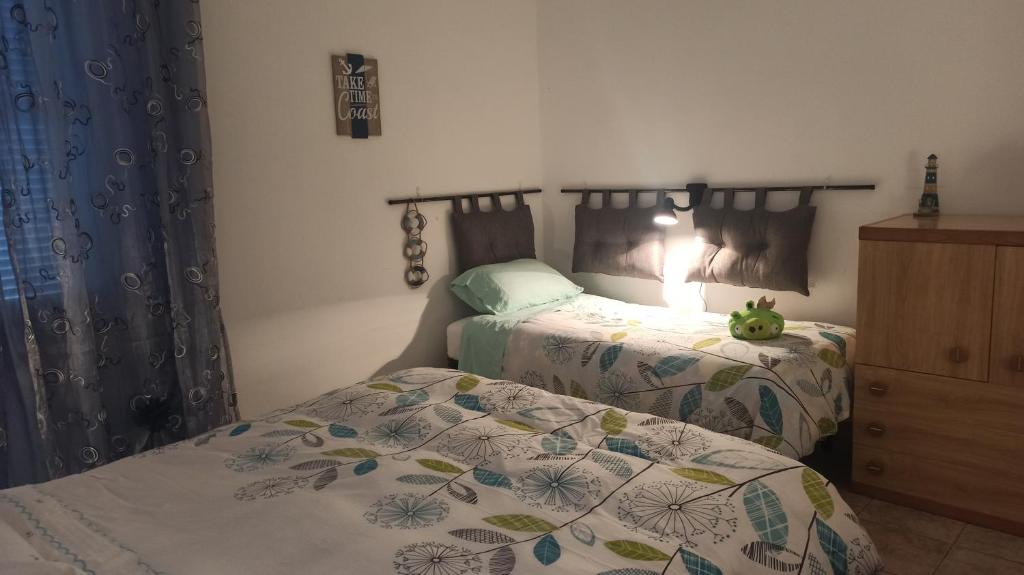 Posteľ alebo postele v izbe v ubytovaní Casa al Mare Fontespina