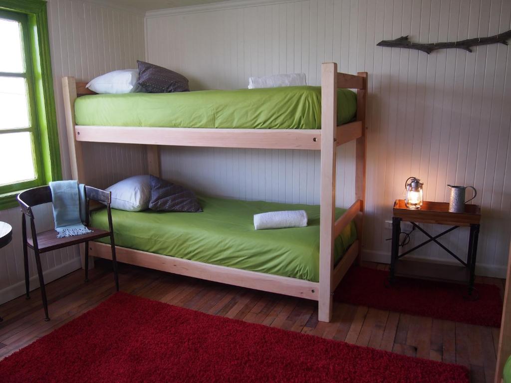 Uma cama ou camas num quarto em Wild Hostel