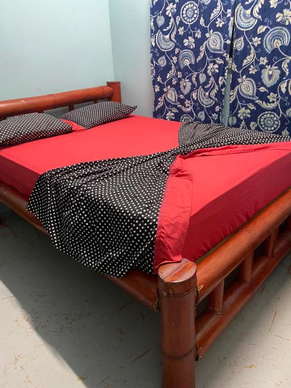 Postel nebo postele na pokoji v ubytování Luminosa Uvita Hostel