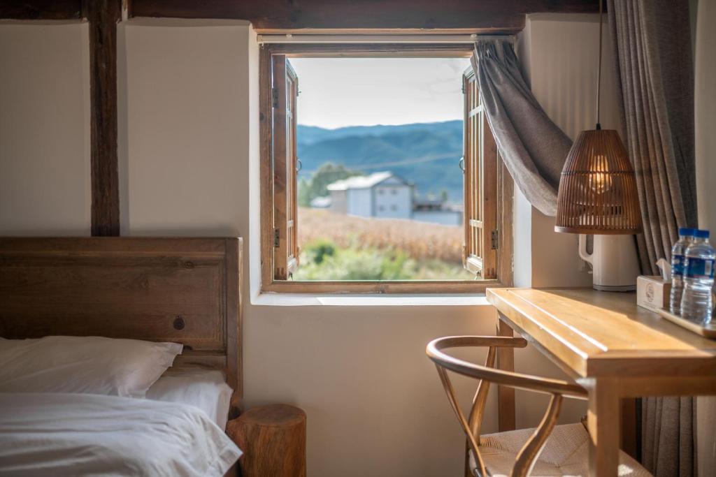 Fotografie z fotogalerie ubytování Inn in the field v destinaci Jianchuan