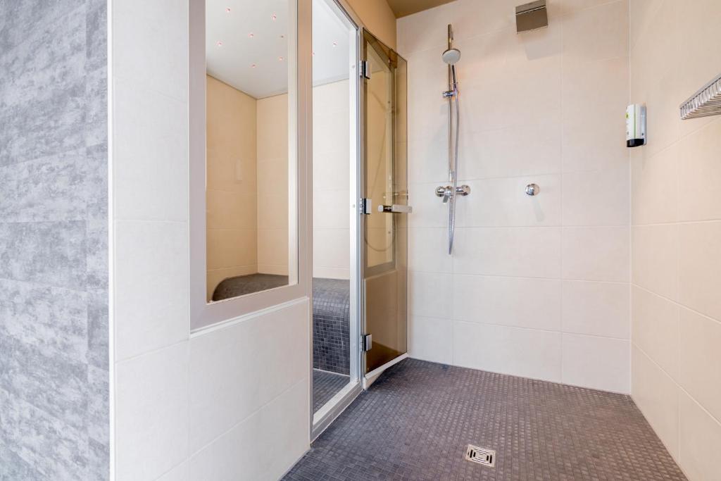 Koupelna v ubytování Hotel Bacchus