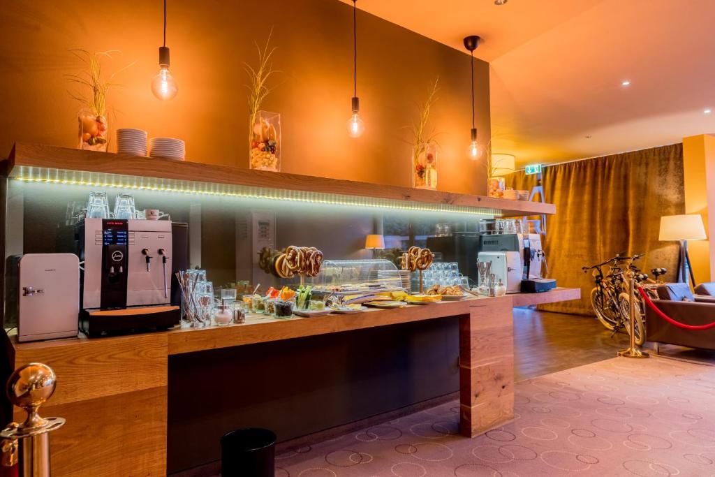 Kuchyň nebo kuchyňský kout v ubytování Hotel Bacchus