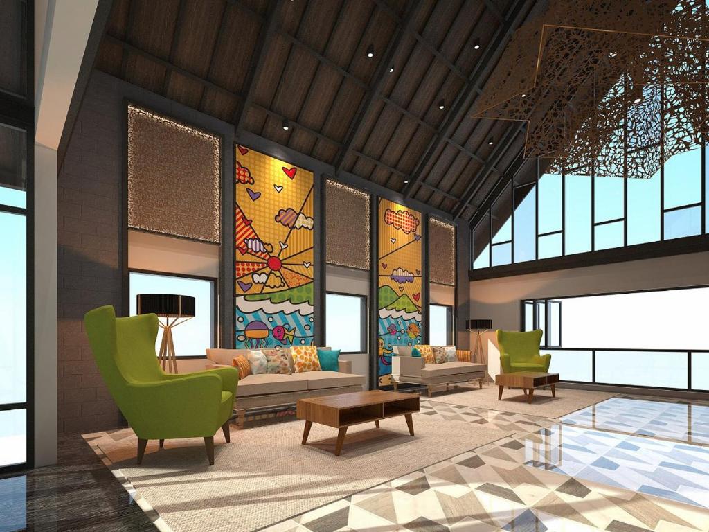 eine Lobby mit farbenfrohen Möbeln und Buntglasfenstern in der Unterkunft MaxOneHotels @Anyer in Banten