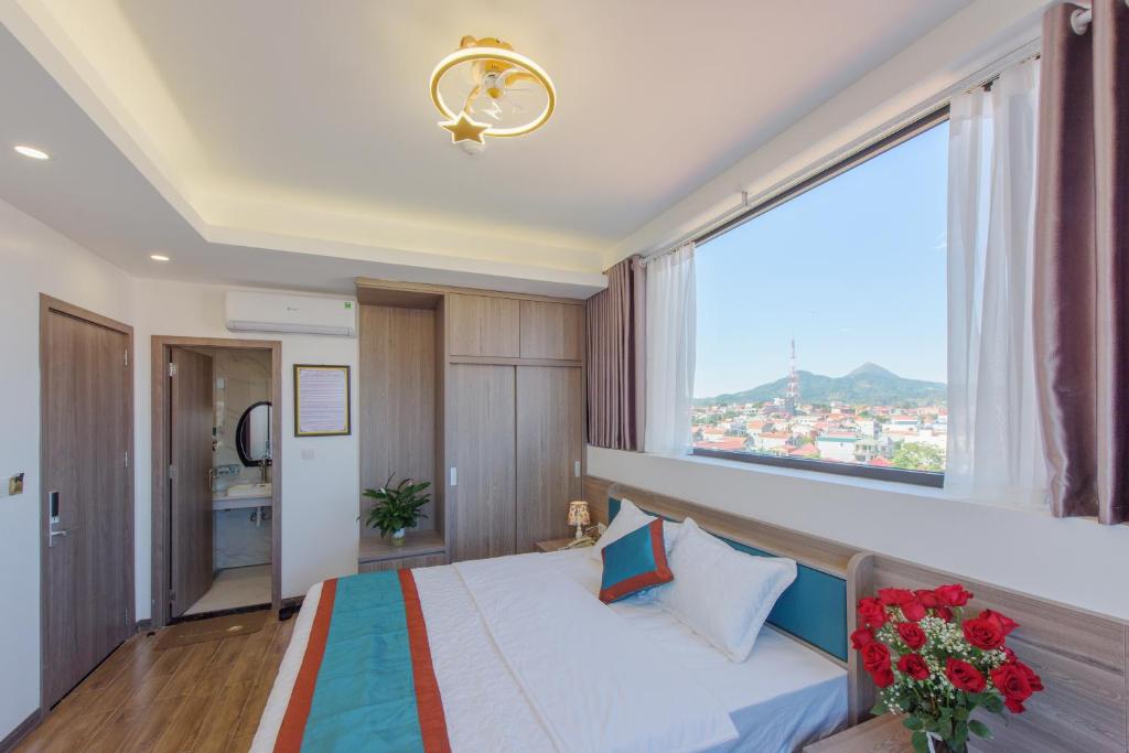 Katil atau katil-katil dalam bilik di LONG VŨ HOTEL