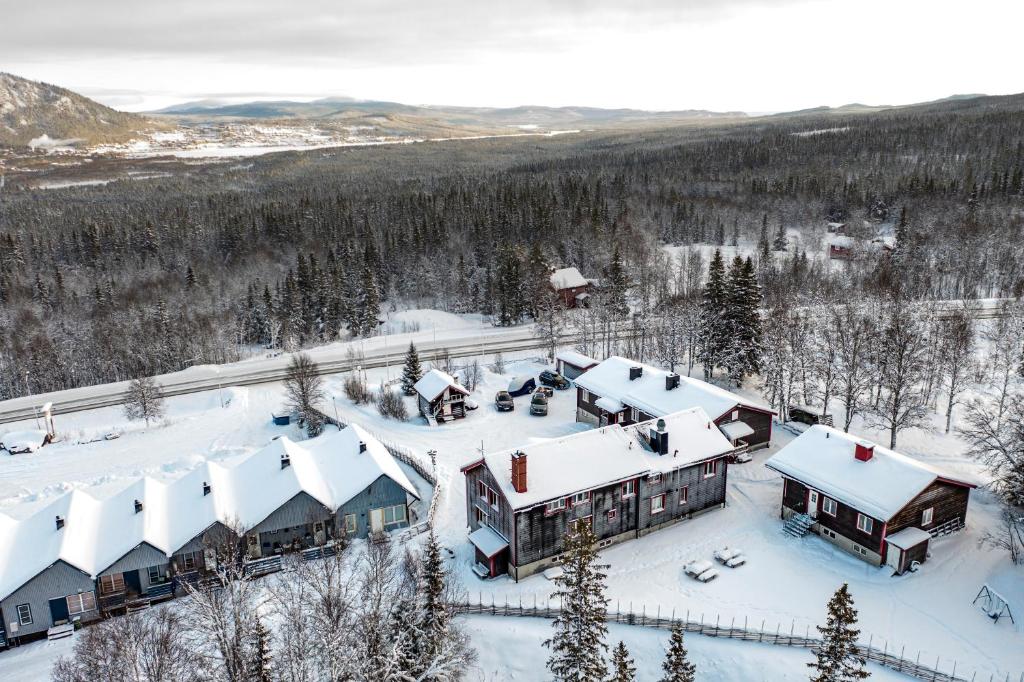 an aerial view of a resort in the snow at North Mountain Lodge in Funäsdalen