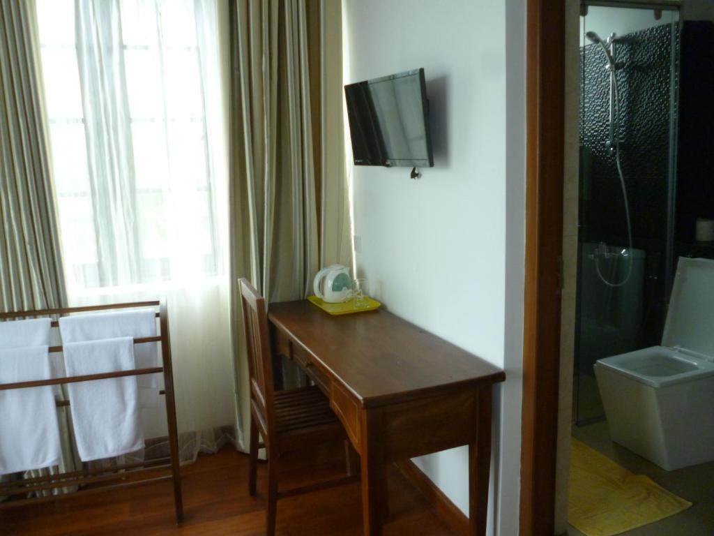 TV a/nebo společenská místnost v ubytování Daffodil's Hotel