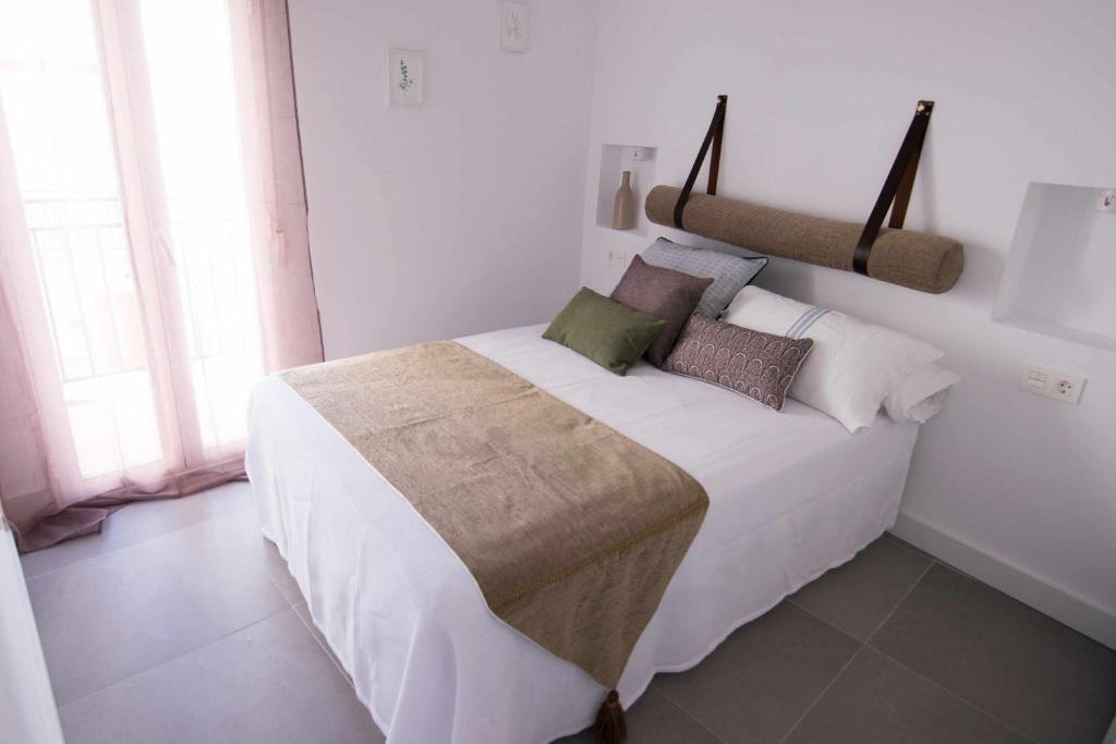 Postel nebo postele na pokoji v ubytování Casa Carmen Terraza y patio privado en Salobreña