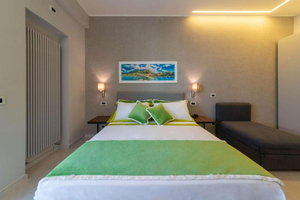 Posteľ alebo postele v izbe v ubytovaní B&B La Piazzetta
