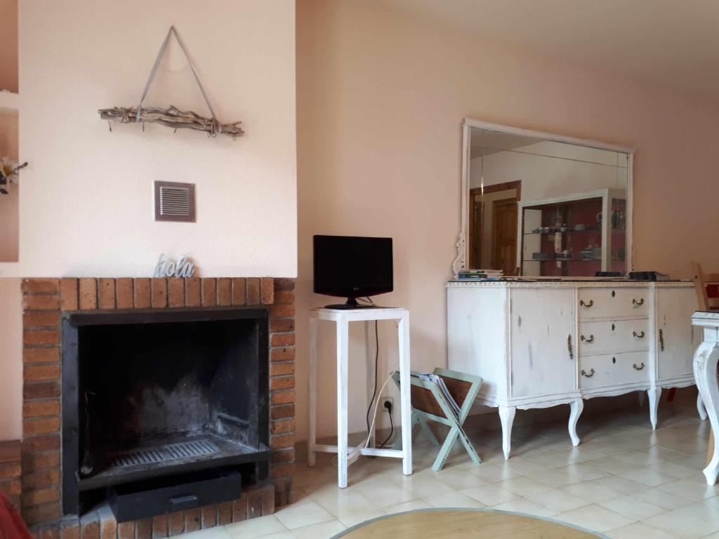 TV a/nebo společenská místnost v ubytování Apartamento Vall Fosca