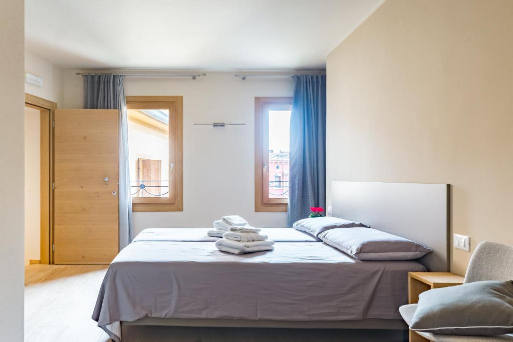 Posteľ alebo postele v izbe v ubytovaní Guest House La Sosta