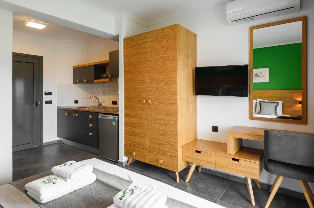 A kitchen or kitchenette at Botanica Luxury Suites
