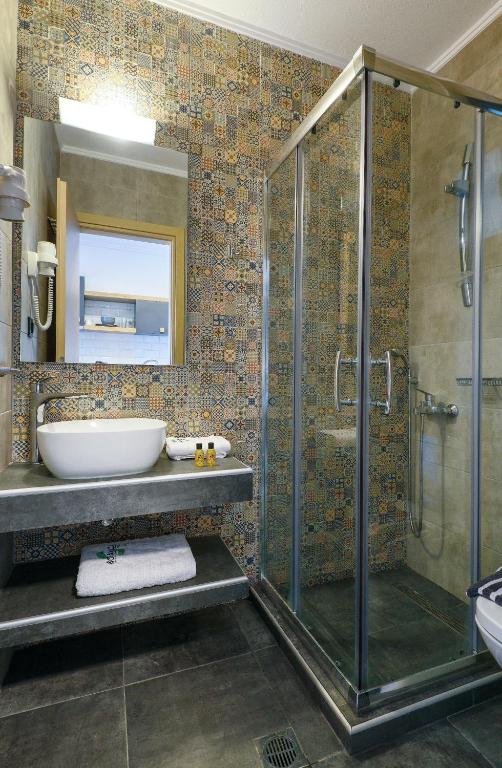 A bathroom at Botanica Luxury Suites