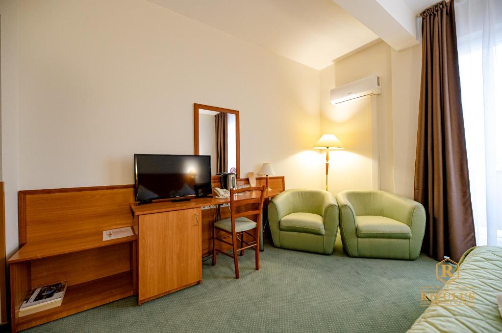 TV a/nebo společenská místnost v ubytování Hotel Rivulus
