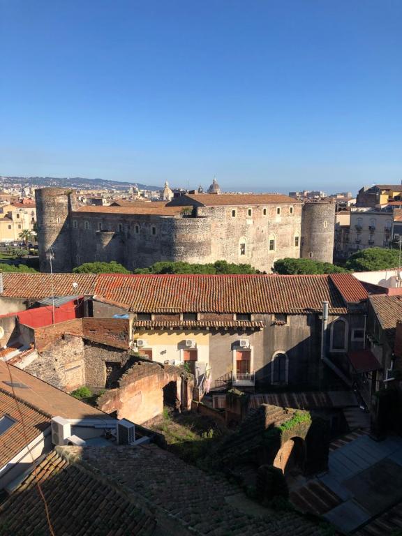 a view of a city with buildings and roofs at Ursino's Luxury in Catania