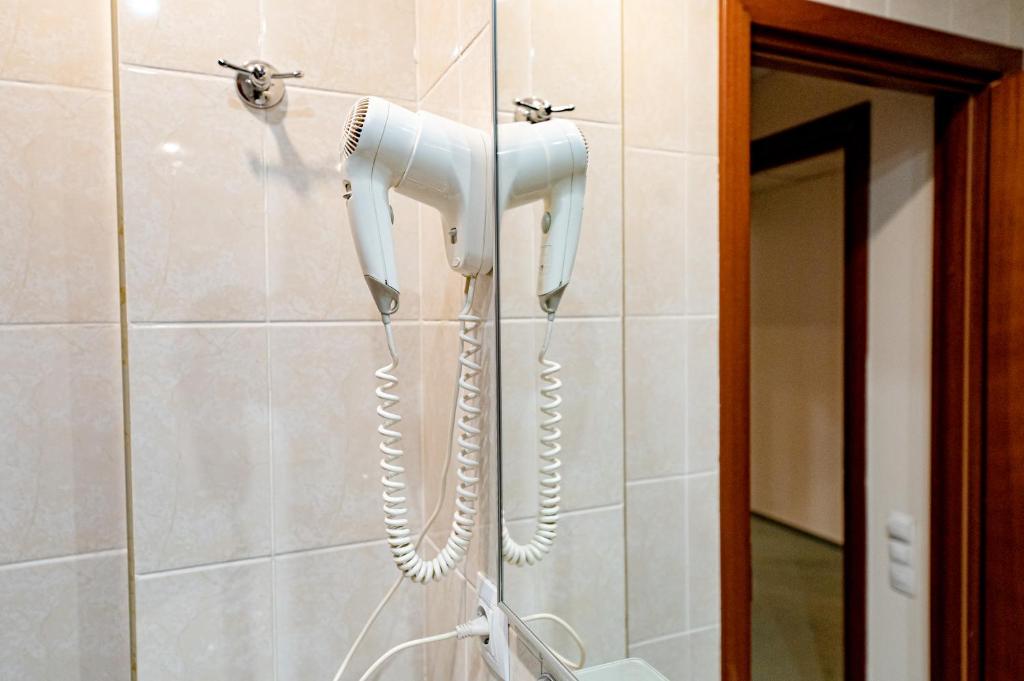 Koupelna v ubytování Hotel Rivulus
