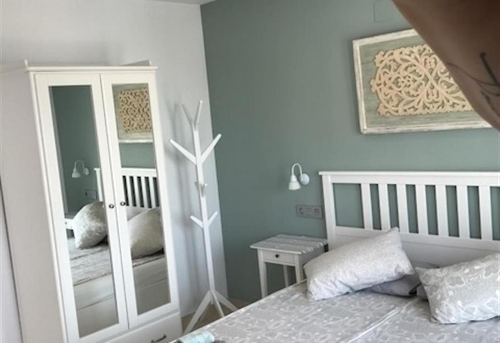 Posteľ alebo postele v izbe v ubytovaní Wonderful Apartment Capri