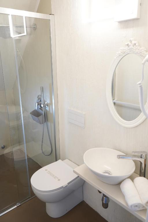 Koupelna v ubytování Hotel Rex