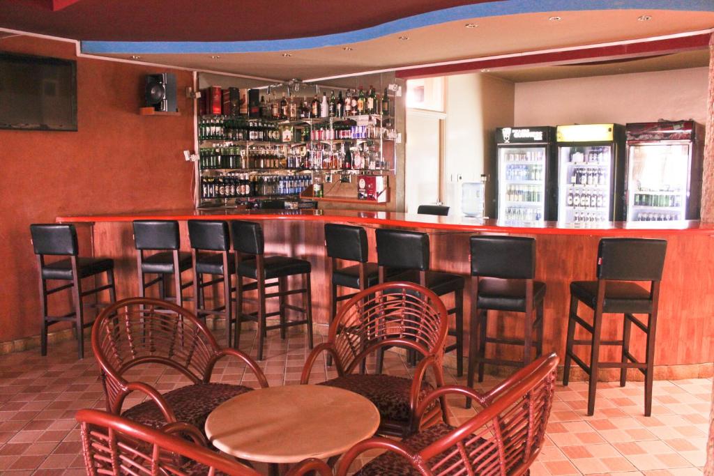 Lounge nebo bar v ubytování Pearl Palace Hotel