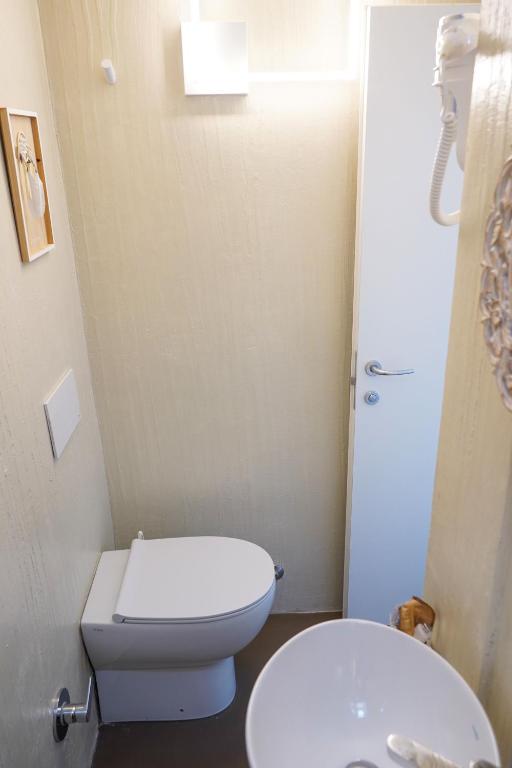 Koupelna v ubytování Hotel Rex