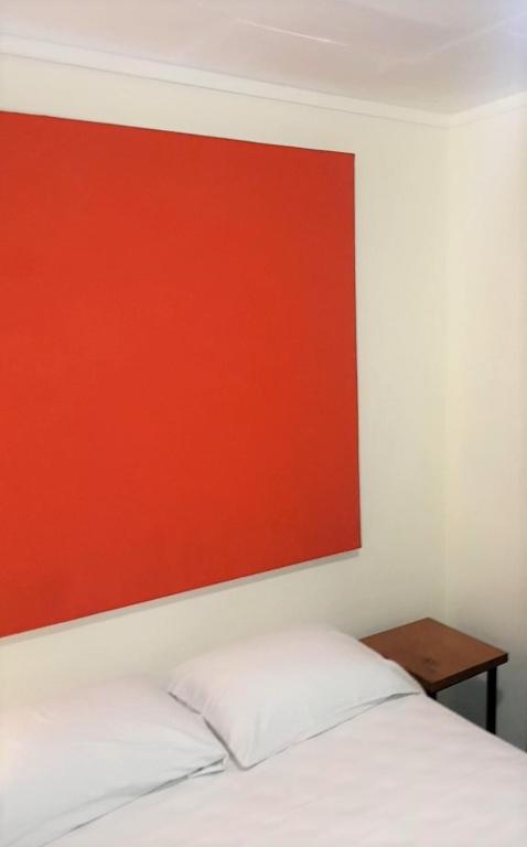 Postel nebo postele na pokoji v ubytování Hostel Dodero