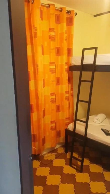 Postel nebo postele na pokoji v ubytování Hostel Dodero