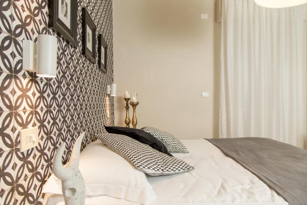 Postel nebo postele na pokoji v ubytování Hotel Rex