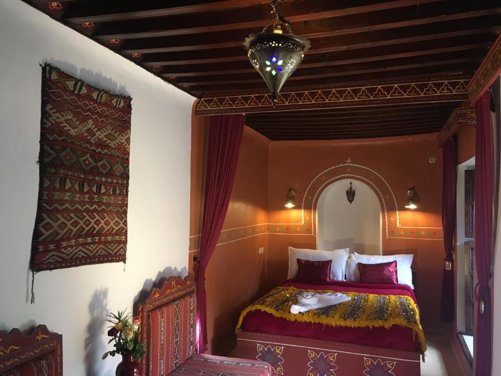 Postel nebo postele na pokoji v ubytování Riad Blue Berber