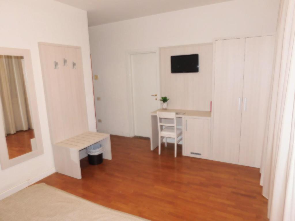 TV a/nebo společenská místnost v ubytování Hotel La Pace