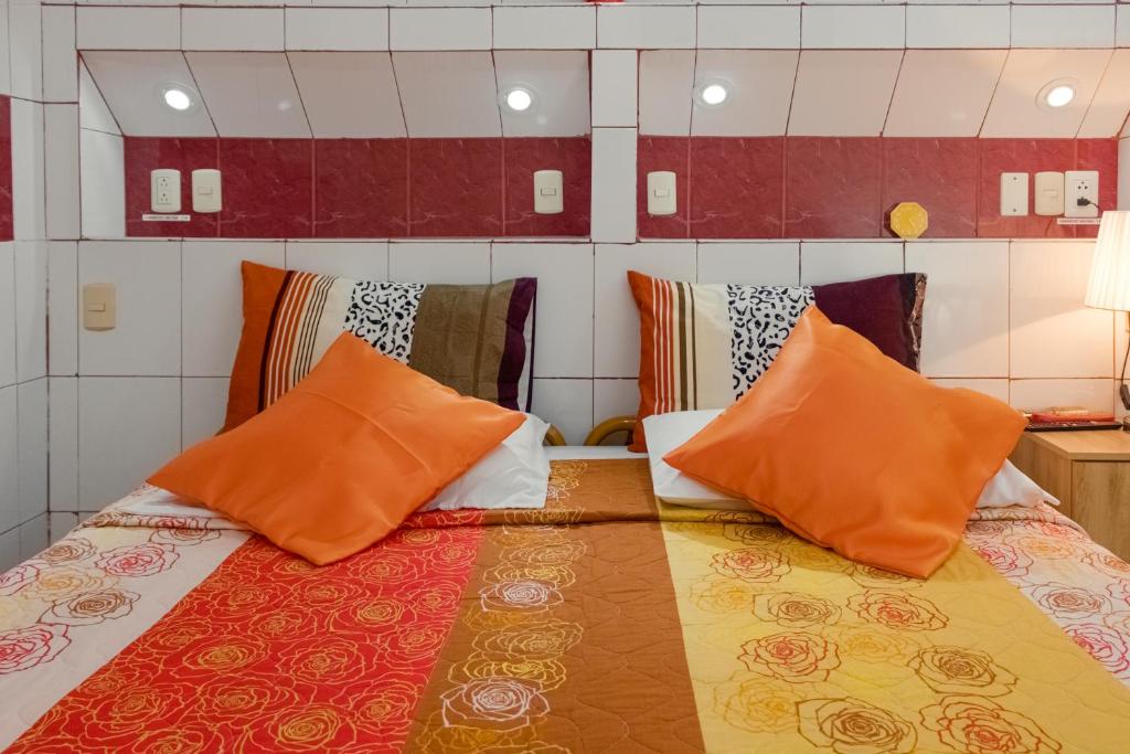 Postel nebo postele na pokoji v ubytování Hotel Livingston Inn