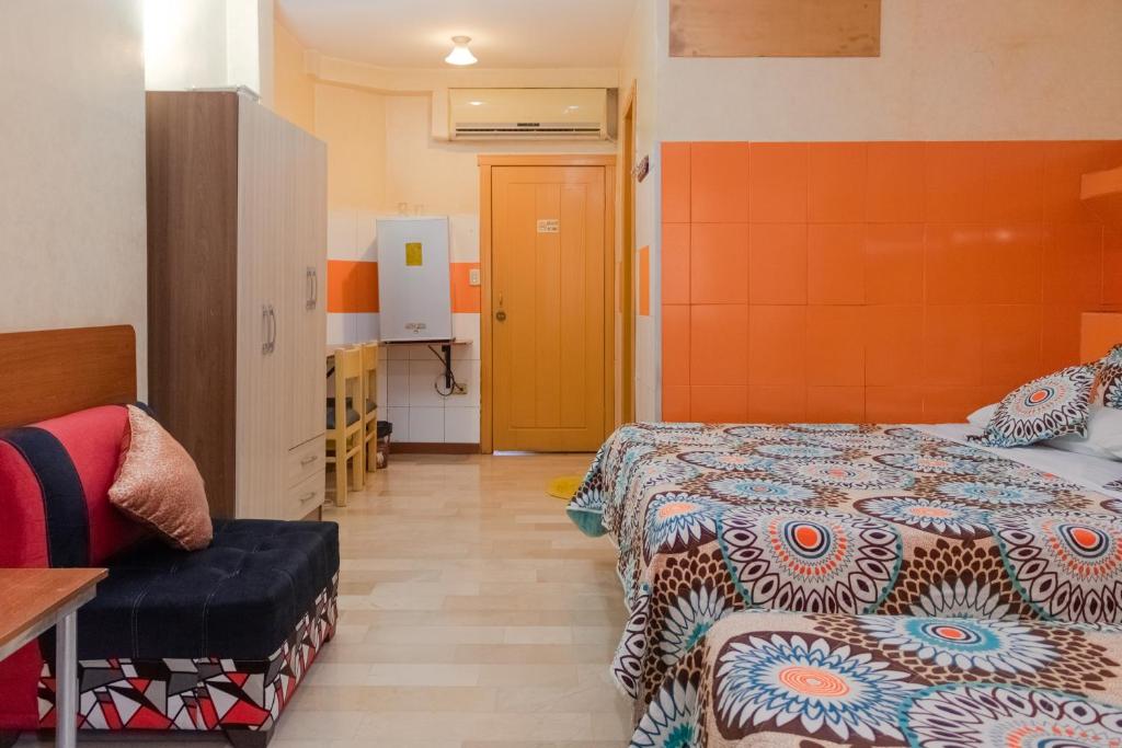Postel nebo postele na pokoji v ubytování Hotel Livingston Inn