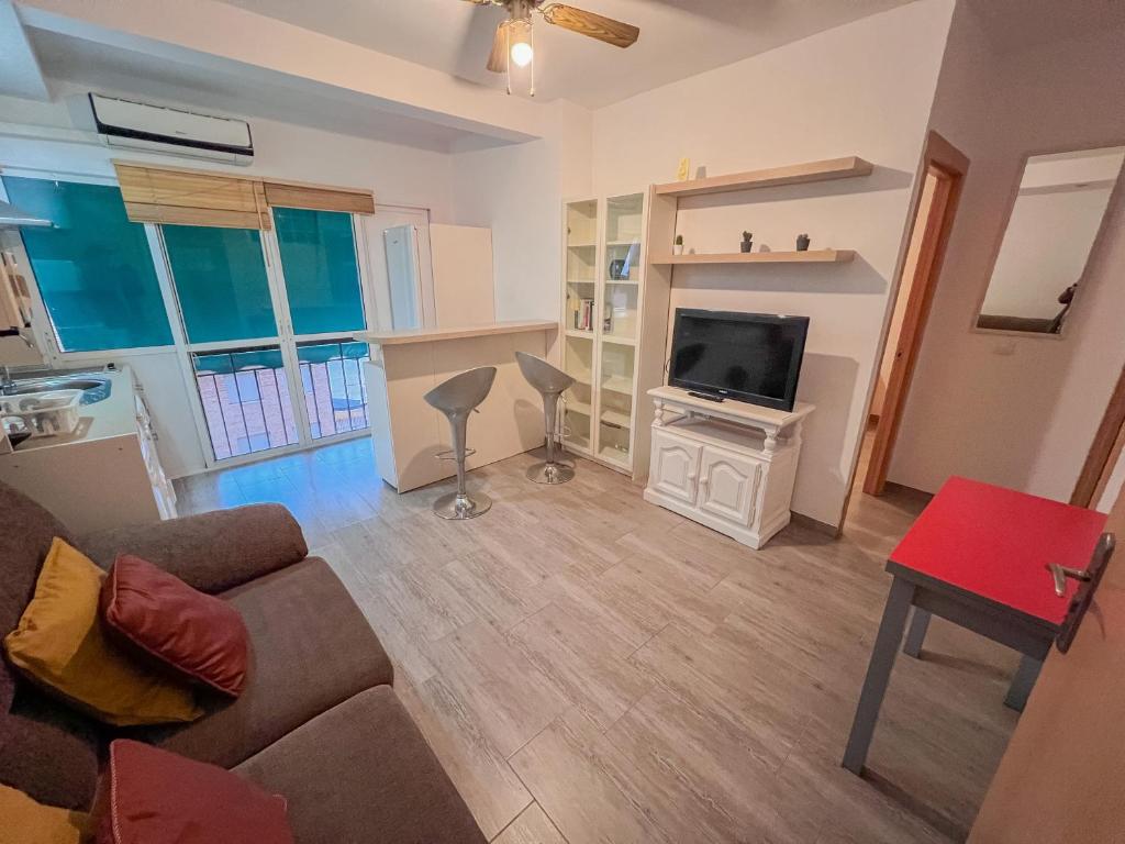 Televízia a/alebo spoločenská miestnosť v ubytovaní Bonito apartamento cerca del puerto