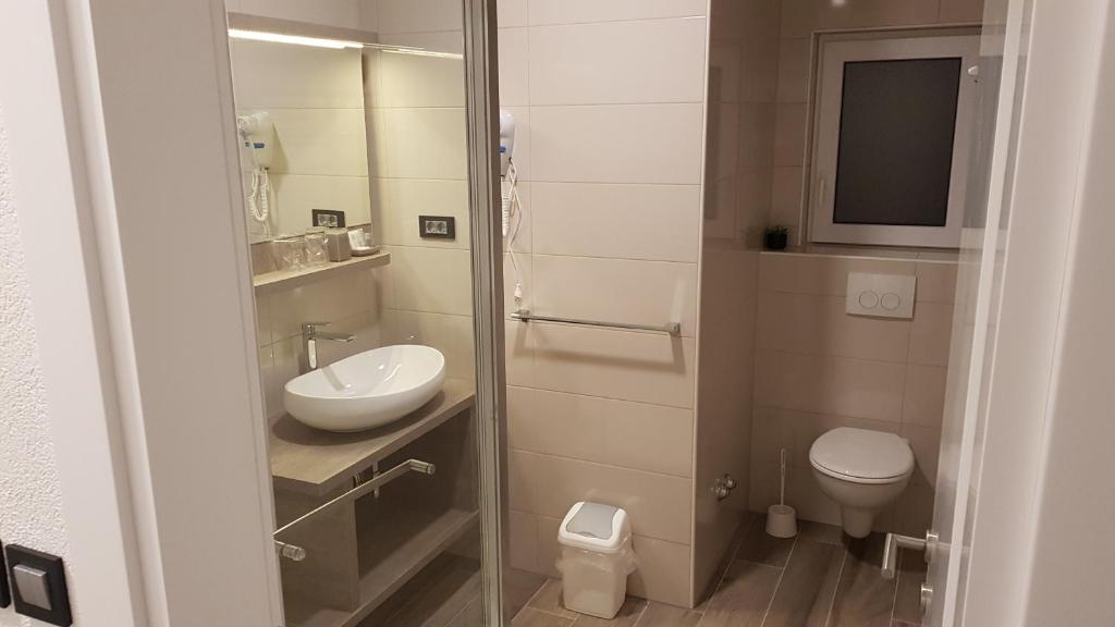 Koupelna v ubytování Premium Appartments Suha Punta