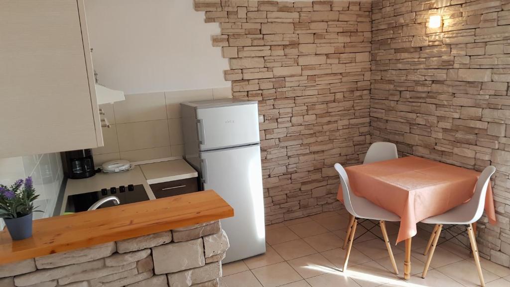 Kuchyň nebo kuchyňský kout v ubytování Premium Appartments Suha Punta