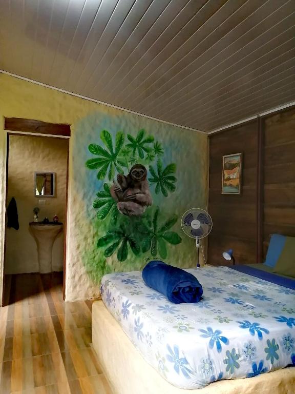 Postel nebo postele na pokoji v ubytování Cecropia Ecolodge