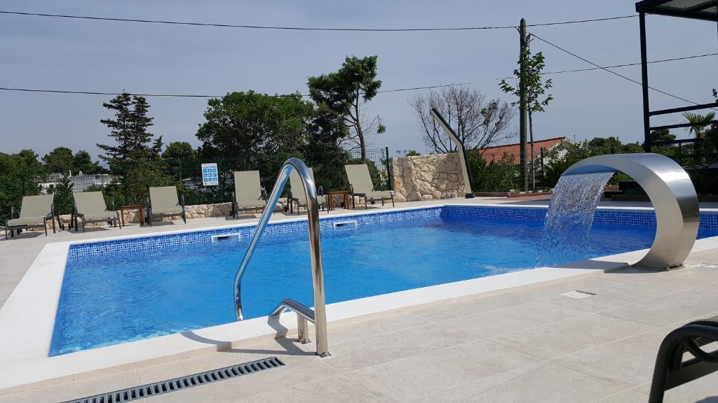 Bazén v ubytování Premium Appartments Suha Punta nebo v jeho okolí