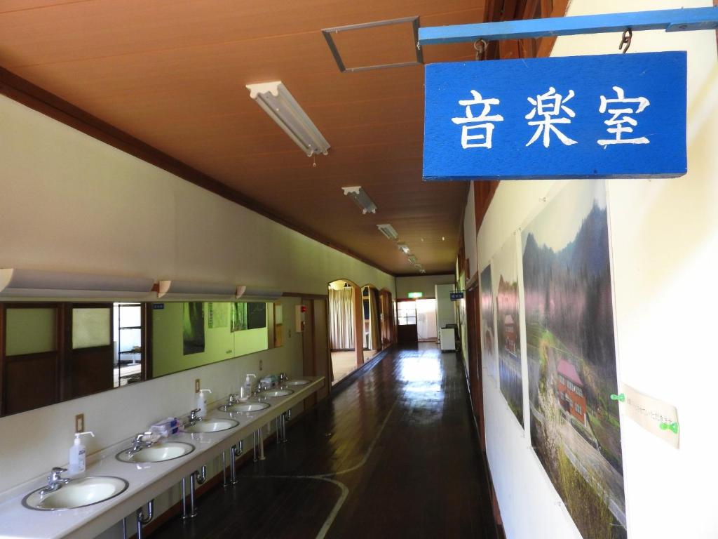 a row of sinks in a public restroom at Mori no Bunkou Fuzawa - Vacation STAY 93238v in Kobayashi