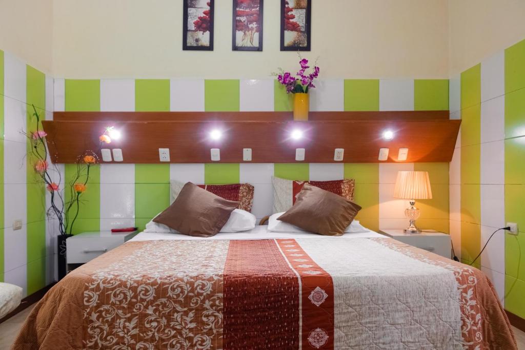 Postel nebo postele na pokoji v ubytování Hotel Livingston Inn