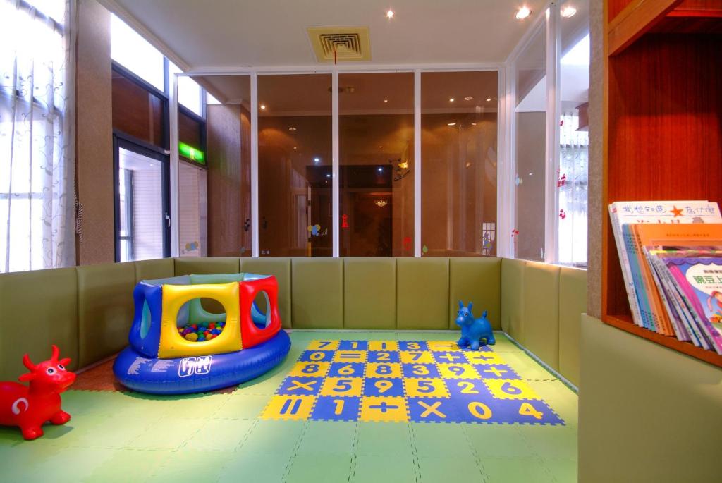 a childs play room with a bounceername at F Hotel Tainan in Tainan