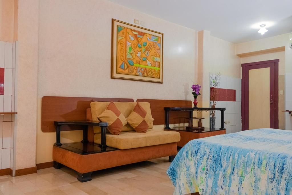 Postel nebo postele na pokoji v ubytování Hotel Livingston Inn
