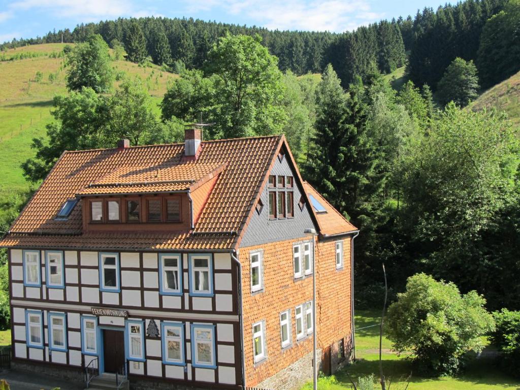 an old house in the middle of a field at Hexenstieg House Lerbach in Osterode